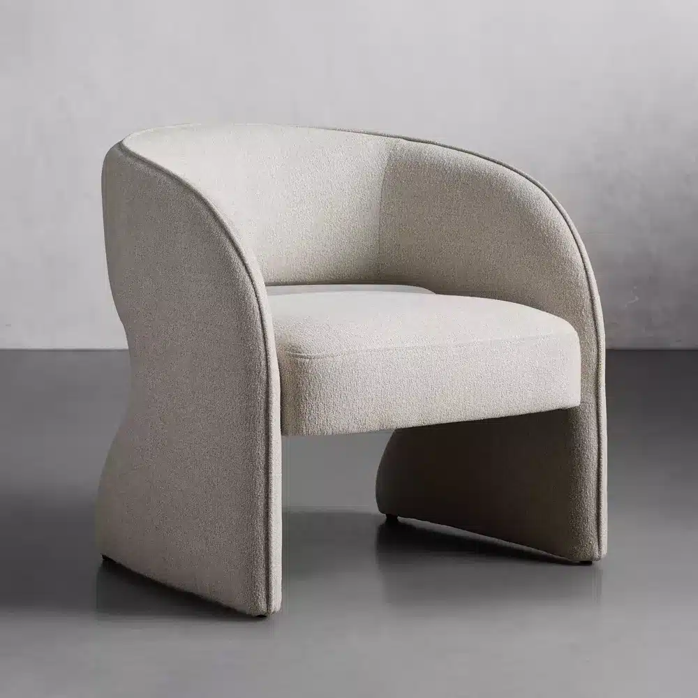 a white chair with curved legs
