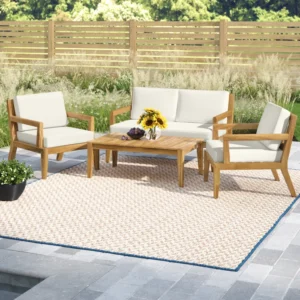 This 4-piece outdoor seating group lets you catch up with family and friends on your patio or deck. It includes a loveseat, two armchairs, and a coffee table. Each piece is crafted from solid acacia wood